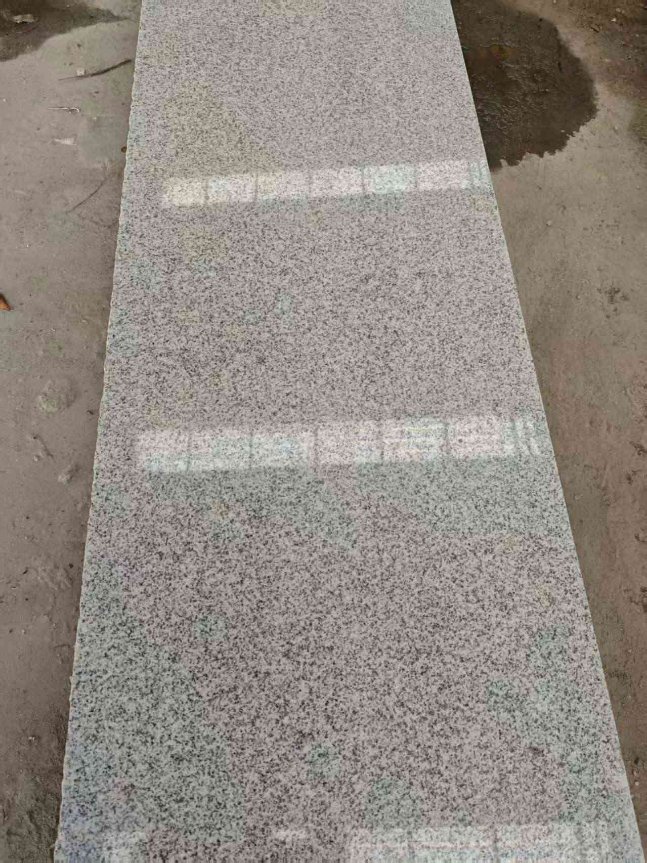 中卫芝麻白光面毛板